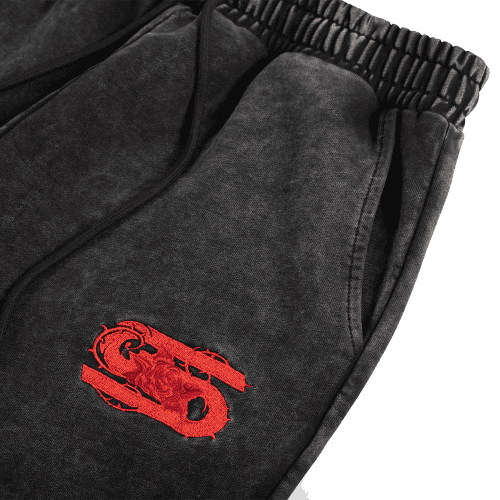 twisted rose sweatpants logo